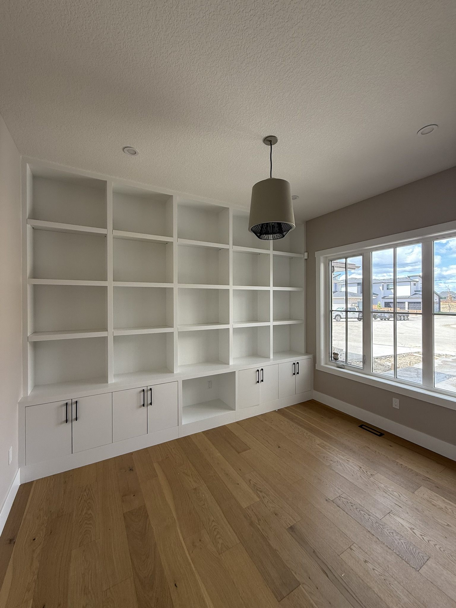 Built-in millwork shelving wall